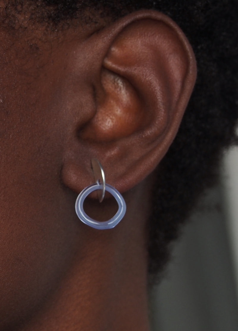 model image of sterling silver and blue glass hoop earrings