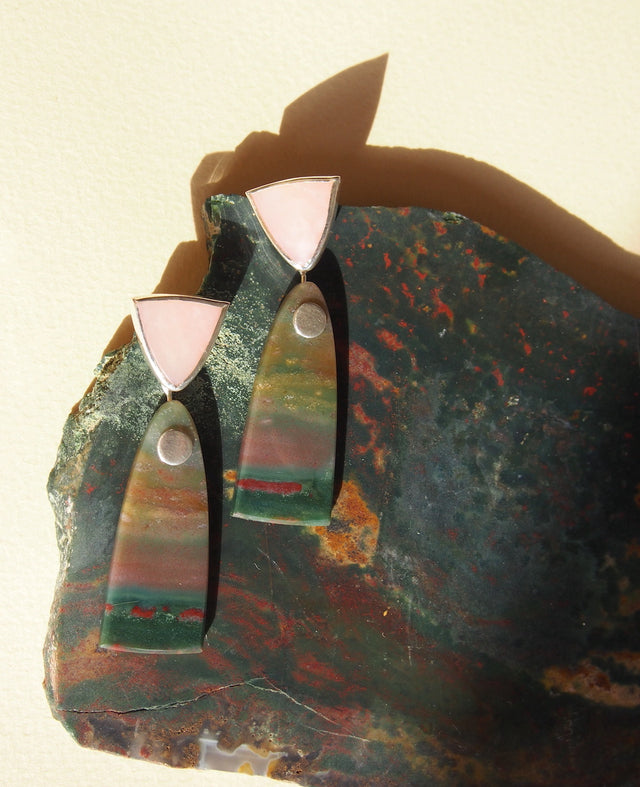 detail shot of sterling silver earrings with pink opal and bloodstone